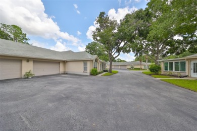 **CLICK ON VIRTUAL TOUR ABOVE** Maintenance FREE Living in the on The Golf Club of Cypress Creek in Florida - for sale on GolfHomes.com, golf home, golf lot