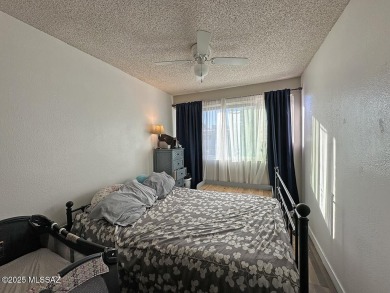 This 2-bedroom, 1-bath upstairs unit in a central Tucson coop on Randolph Park Golf Courses in Arizona - for sale on GolfHomes.com, golf home, golf lot