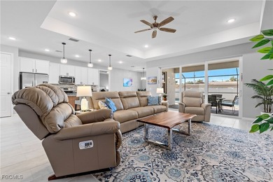 Experience elevated Southwest Florida living in this beautifully on Royal Tee Country Club in Florida - for sale on GolfHomes.com, golf home, golf lot