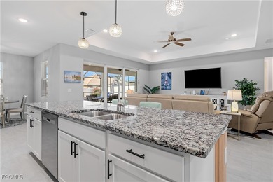 Experience elevated Southwest Florida living in this beautifully on Royal Tee Country Club in Florida - for sale on GolfHomes.com, golf home, golf lot