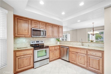 Get ready to fall in love with this breathtaking townhome! on Anaheim Hills Golf Course in California - for sale on GolfHomes.com, golf home, golf lot