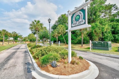 Best view in River Oaks! Fully furnished, first floor end unit on River Oaks Golf Plantation  in South Carolina - for sale on GolfHomes.com, golf home, golf lot