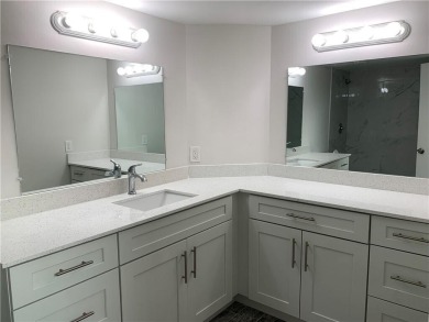 Stunning 1-story, CBS 3BR/2BA home, move-in ready, low HOA fee on Old Palm Golf Club in Florida - for sale on GolfHomes.com, golf home, golf lot