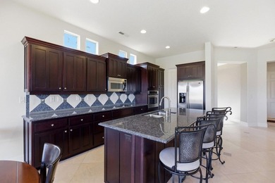 Experience refined desert living in this beautiful former model on Sunbrook Golf Course in Utah - for sale on GolfHomes.com, golf home, golf lot