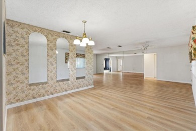 3/2 DOGWOOD WITH A POOL & 4 PERSON HOT TUB!  Located in the on The Links of Spruce Creek in Florida - for sale on GolfHomes.com, golf home, golf lot