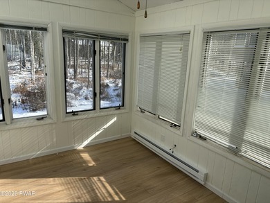 Like New Modern Chalet with 4 Bedrooms and 2 Full Bathrooms in on The Hideout Golf in Pennsylvania - for sale on GolfHomes.com, golf home, golf lot