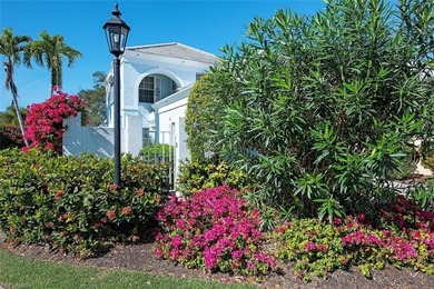 Discover tranquility in this exquisite Avignon model, a on Club at Pelican Bay Golf Course in Florida - for sale on GolfHomes.com, golf home, golf lot