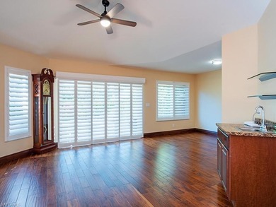 Discover tranquility in this exquisite Avignon model, a on Club at Pelican Bay Golf Course in Florida - for sale on GolfHomes.com, golf home, golf lot