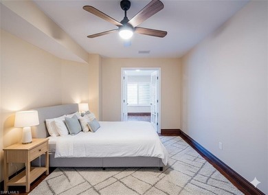 Discover tranquility in this exquisite Avignon model, a on Club at Pelican Bay Golf Course in Florida - for sale on GolfHomes.com, golf home, golf lot