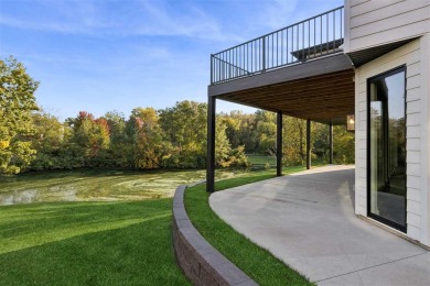 Enjoy this expansive open design with clean lines featuring some on Brown Deer Golf Club in Iowa - for sale on GolfHomes.com, golf home, golf lot