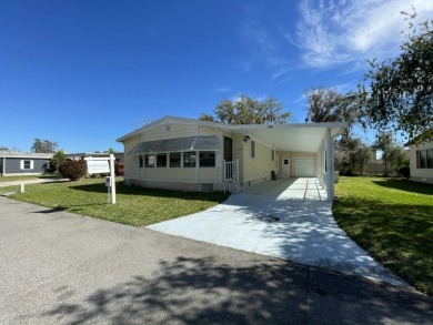 Indulge in the epitome of luxurious living with this double wide on The Meadows At Countrywood in Florida - for sale on GolfHomes.com, golf home, golf lot