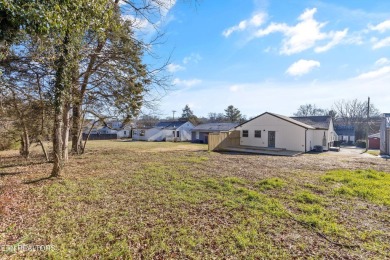 Stunning complete remodel in the Whittle Springs area of North on Whittle Springs Golf Course in Tennessee - for sale on GolfHomes.com, golf home, golf lot