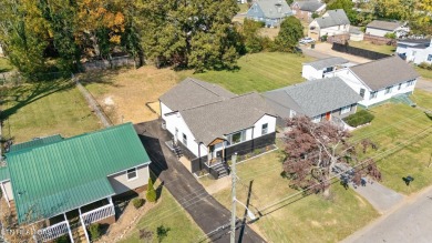 Stunning complete remodel in the Whittle Springs area of North on Whittle Springs Golf Course in Tennessee - for sale on GolfHomes.com, golf home, golf lot