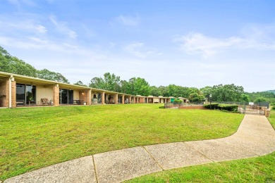 This condo is a unique jewel with tons of history.  A retired on Belvedere Golf Club in Arkansas - for sale on GolfHomes.com, golf home, golf lot