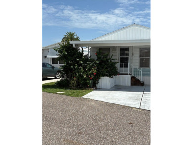 LOCATION, LOCATION, LOCATION!  This furnished doublewide home on Polo Park East in Florida - for sale on GolfHomes.com, golf home, golf lot