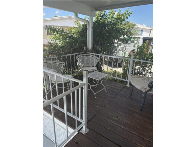 LOCATION, LOCATION, LOCATION!  This furnished doublewide home on Polo Park East in Florida - for sale on GolfHomes.com, golf home, golf lot
