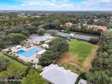 Stunning 4,472 sq ft custom home in the beautiful Queens Harbor on Queens Harbour Yacht and Country Club in Florida - for sale on GolfHomes.com, golf home, golf lot