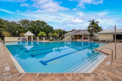 Stunning 4,472 sq ft custom home in the beautiful Queens Harbor on Queens Harbour Yacht and Country Club in Florida - for sale on GolfHomes.com, golf home, golf lot