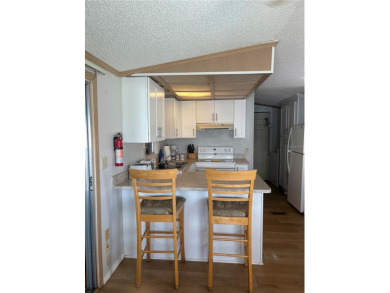 LOCATION, LOCATION, LOCATION!  This furnished doublewide home on Polo Park East in Florida - for sale on GolfHomes.com, golf home, golf lot