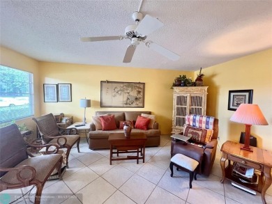 WATERVIEW! FIRST FLOOR, TWO BEDROOM, TWO FULL BATH HOME WITH A on Hillsboro Pines Golf in Florida - for sale on GolfHomes.com, golf home, golf lot