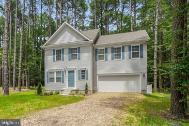 Welcome to your dream home nestled at the end of a serene on Captains Cove Golf and Yacht Club in Virginia - for sale on GolfHomes.com, golf home, golf lot