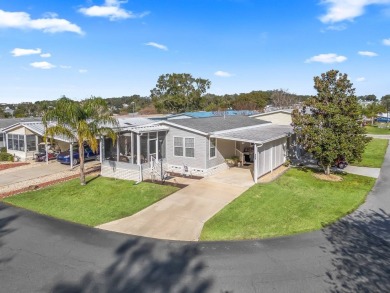 This high end Manufactured home on an Ultimately landscaped on Water Oak Country Club Estates in Florida - for sale on GolfHomes.com, golf home, golf lot