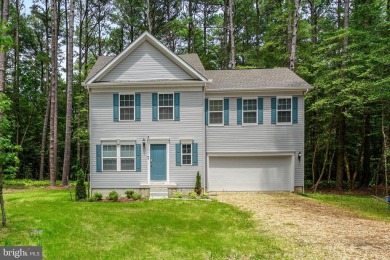 Welcome to your dream home nestled at the end of a serene on Captains Cove Golf and Yacht Club in Virginia - for sale on GolfHomes.com, golf home, golf lot