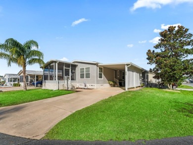 This high end Manufactured home on an Ultimately landscaped on Water Oak Country Club Estates in Florida - for sale on GolfHomes.com, golf home, golf lot