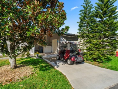 This high end Manufactured home on an Ultimately landscaped on Water Oak Country Club Estates in Florida - for sale on GolfHomes.com, golf home, golf lot