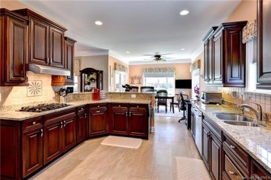A truly coveted *Christopher Wren* model overlooking the fairway on Colonial Heritage Golf Club in Virginia - for sale on GolfHomes.com, golf home, golf lot