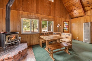 Enveloped by a quiet grove of mature pines and backing to a on Big Bear Mountain Ski and Golf Resort in California - for sale on GolfHomes.com, golf home, golf lot