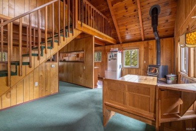 Enveloped by a quiet grove of mature pines and backing to a on Big Bear Mountain Ski and Golf Resort in California - for sale on GolfHomes.com, golf home, golf lot