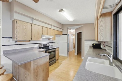 Welcome to easy, low-maintenance living in this charming on Highland Fairways Golf Club in Florida - for sale on GolfHomes.com, golf home, golf lot