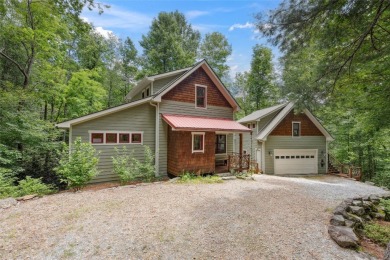 Nestled in the heart of North Carolina's Blue Ridge Mountains on Sapphire National Golf Club in North Carolina - for sale on GolfHomes.com, golf home, golf lot