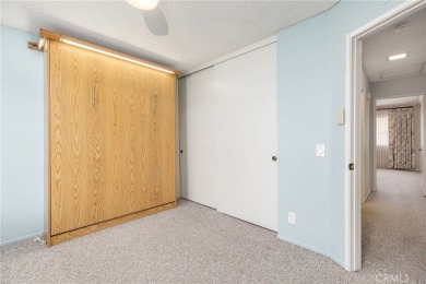 Looking for a condo with a superb floorplan and a comforting on Sun Lakes Country Club in California - for sale on GolfHomes.com, golf home, golf lot