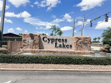 Welcome to your Florida oasis! This fully renovated and spacious on Cypress Lakes Golf Course - West Palm Beach in Florida - for sale on GolfHomes.com, golf home, golf lot