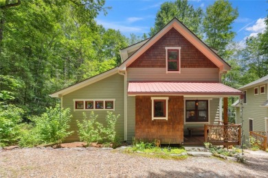 Nestled in the heart of North Carolina's Blue Ridge Mountains on Sapphire National Golf Club in North Carolina - for sale on GolfHomes.com, golf home, golf lot