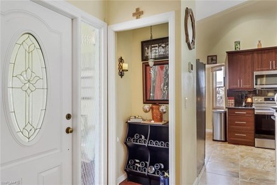 As you enter this charming home, picture yourself enjoying and on Countryside Golf and Country Club in Florida - for sale on GolfHomes.com, golf home, golf lot