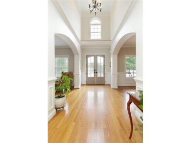 This custom-built home sits on a roundabout cul-de-sac nestled on Hampton Golf Village in Georgia - for sale on GolfHomes.com, golf home, golf lot