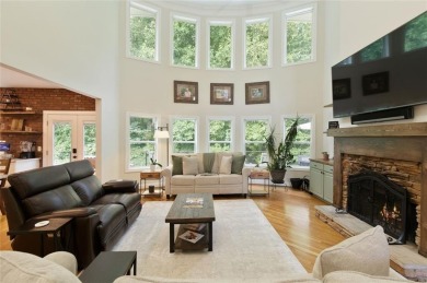This custom-built home sits on a roundabout cul-de-sac nestled on Hampton Golf Village in Georgia - for sale on GolfHomes.com, golf home, golf lot