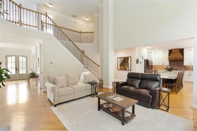 This custom-built home sits on a roundabout cul-de-sac nestled on Hampton Golf Village in Georgia - for sale on GolfHomes.com, golf home, golf lot