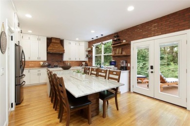 This custom-built home sits on a roundabout cul-de-sac nestled on Hampton Golf Village in Georgia - for sale on GolfHomes.com, golf home, golf lot