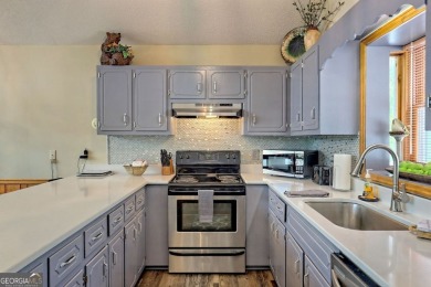 This large 4-bedroom, 3-bedroom home is waiting for new owners on Sky Valley Resort and Country Club in Georgia - for sale on GolfHomes.com, golf home, golf lot