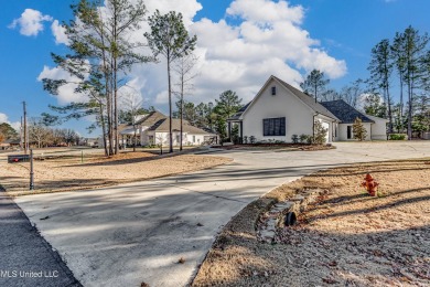 This is the ONE!!!  Well maintained 4bd/3bath in desirable on Lake Caroline Golf Club in Mississippi - for sale on GolfHomes.com, golf home, golf lot