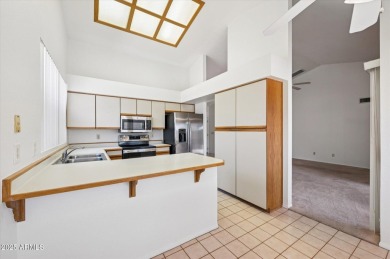 FRESH PAINT INSIDE AND NO MORE POPCORN CEILINGS! Spacious on The Lakes at Ahwatukee in Arizona - for sale on GolfHomes.com, golf home, golf lot