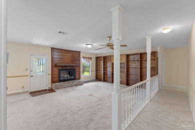 Charming Gulf Breeze brick home nestled in a picturesque setting on Tiger Point Golf and Country Club in Florida - for sale on GolfHomes.com, golf home, golf lot