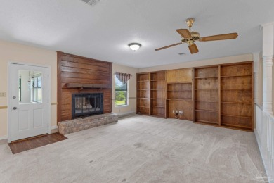 Charming Gulf Breeze brick home nestled in a picturesque setting on Tiger Point Golf and Country Club in Florida - for sale on GolfHomes.com, golf home, golf lot