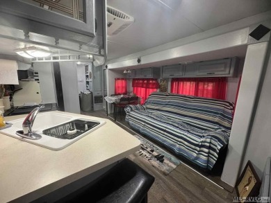 Come check out this camper in the coveted River Ridge Golf and on River Ridge Golf Club in Virginia - for sale on GolfHomes.com, golf home, golf lot