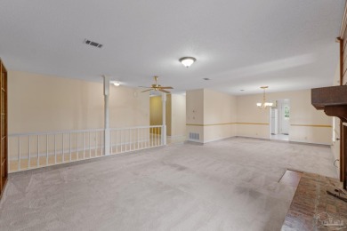Charming Gulf Breeze brick home nestled in a picturesque setting on Tiger Point Golf and Country Club in Florida - for sale on GolfHomes.com, golf home, golf lot
