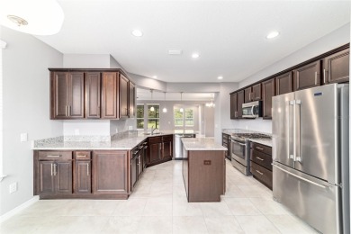 Don't miss out on this beautifully upgraded Monaco model on Trilogy at Ocala Preserve in Florida - for sale on GolfHomes.com, golf home, golf lot